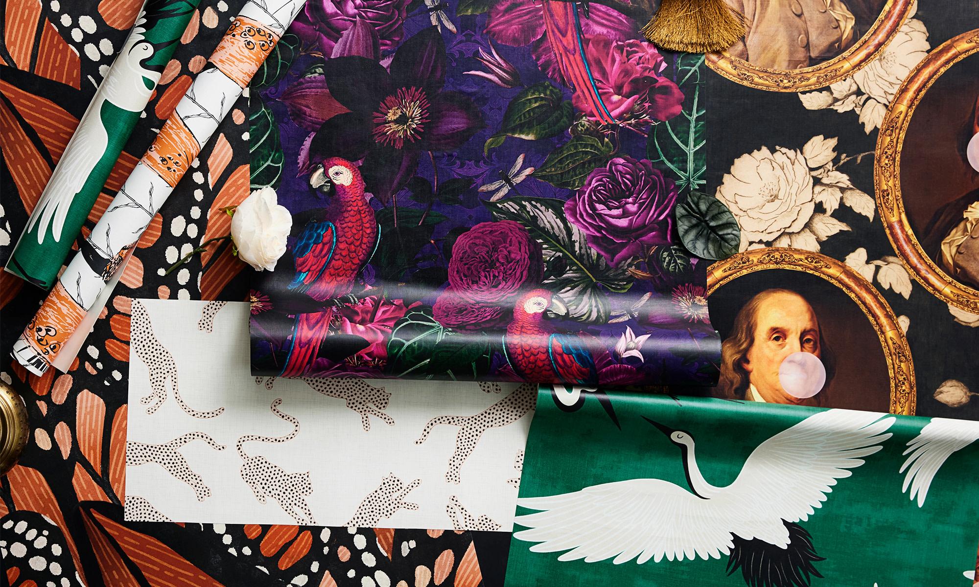 Dramatic glamour peel and stick wallpaper rolls and swathes styled together.