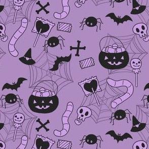 Halloween iconography on purple