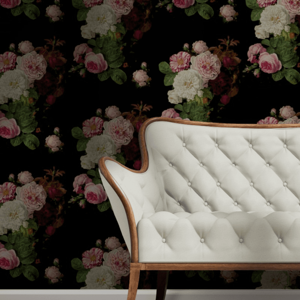 Sofa with dark moody floral wallpaper