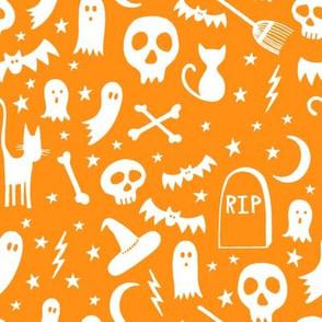 Halloween iconography on orange