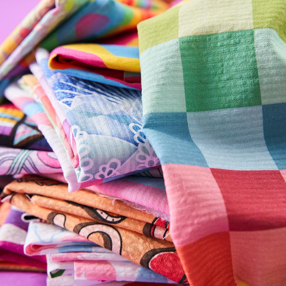 A close up of pride inspired fabrics.