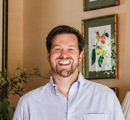 white man brown hair headshot