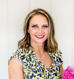 white woman blonde hair headshot